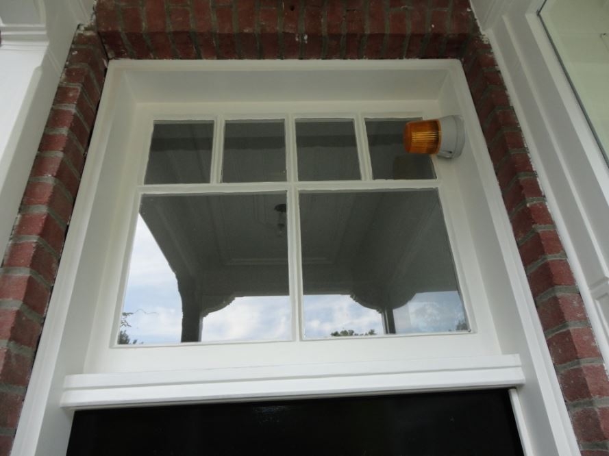 Den-Haag-Timmerwerken-maatwerk-houten-Kozijn-met-raam-houten-belijsting-in-glas
